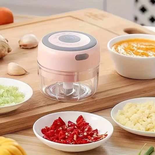 hachoir electrique Siby rose et differents legumes haches- IntelliCuisine